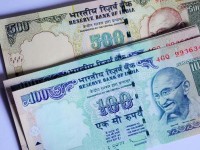 booster-shot-for-rupee-sensex-as-us-fed-retains-stimulus