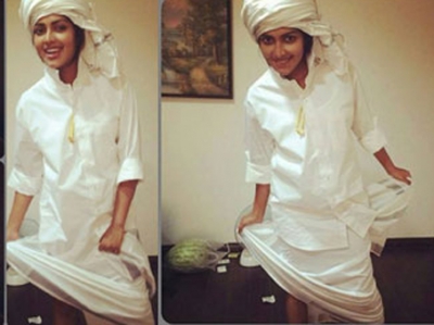 amala-paul-post-a-new-look-picture-on-her-official-facebook-page