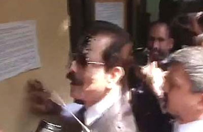 black-ink-splattered-on-sahara-chief