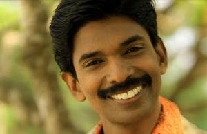 santhosh-pandit-performing-the-role-of-a-poll-official-in-real-life1
