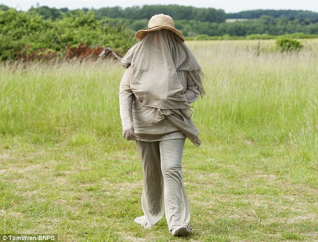 the-woman-allergic-to-electricity-50-year-old-dons-protective-suit-and-veil-to-go-outside-as-she-claims-wi-fi-could-kill-her