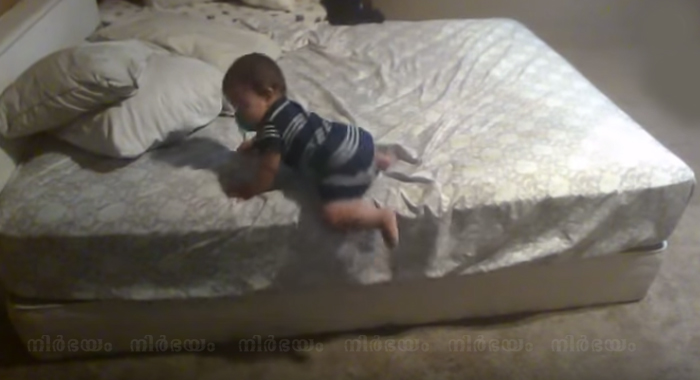smart-baby-throws-down-pillows-on-the-ground-to-safely-get-off-mattress