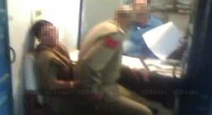 cop-seen-in-pictures-sitting-on-woman-spos-lap-suspended