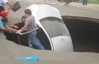 dramatic-moment-family-are-heroically-rescued-from-sinkhole