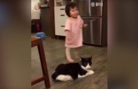 cat-trips-baby-girl-by-grabbing-her-leg-as-she-walks-past