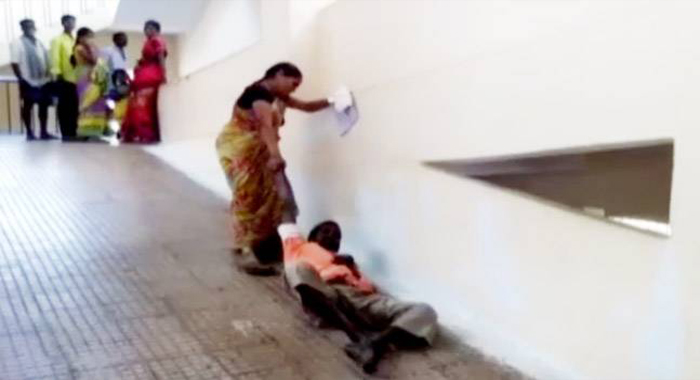 denied-stretcher-wife-drags-husband-to-first-floor-at-a-government-hospital
