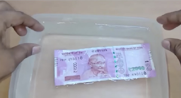 washing-new-2000-rupee-note