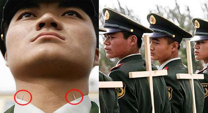 chinese-soldiers-place-needles-in-collars-to-maintain-head-position-during-chinese-parades