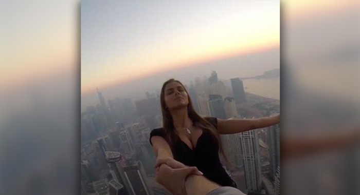 russian-model-viktoria-viki-odintcova-hangs-from-dubais-cayan-tower-instagram-photo-shoot1
