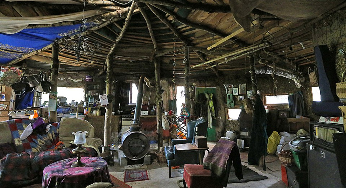 couple-allergic-modern-life-evicted-mud-hut5