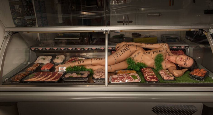 butcher-puts-nude-woman-display-case-social-experiment