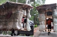 now-thats-mobile-home-chinese-man-carries-portable-house-goes