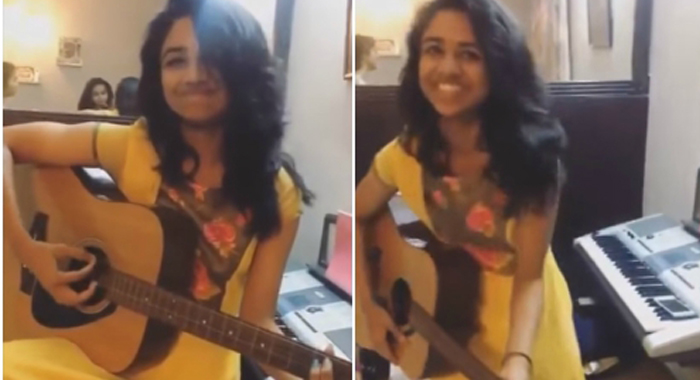 dileep-daughter-meenakshi-playing-guitar