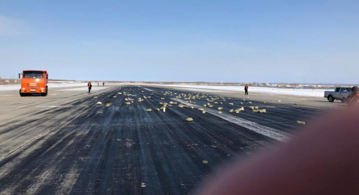 russian-plane-spills-cargo-of-gold-diamonds-during-takeoff
